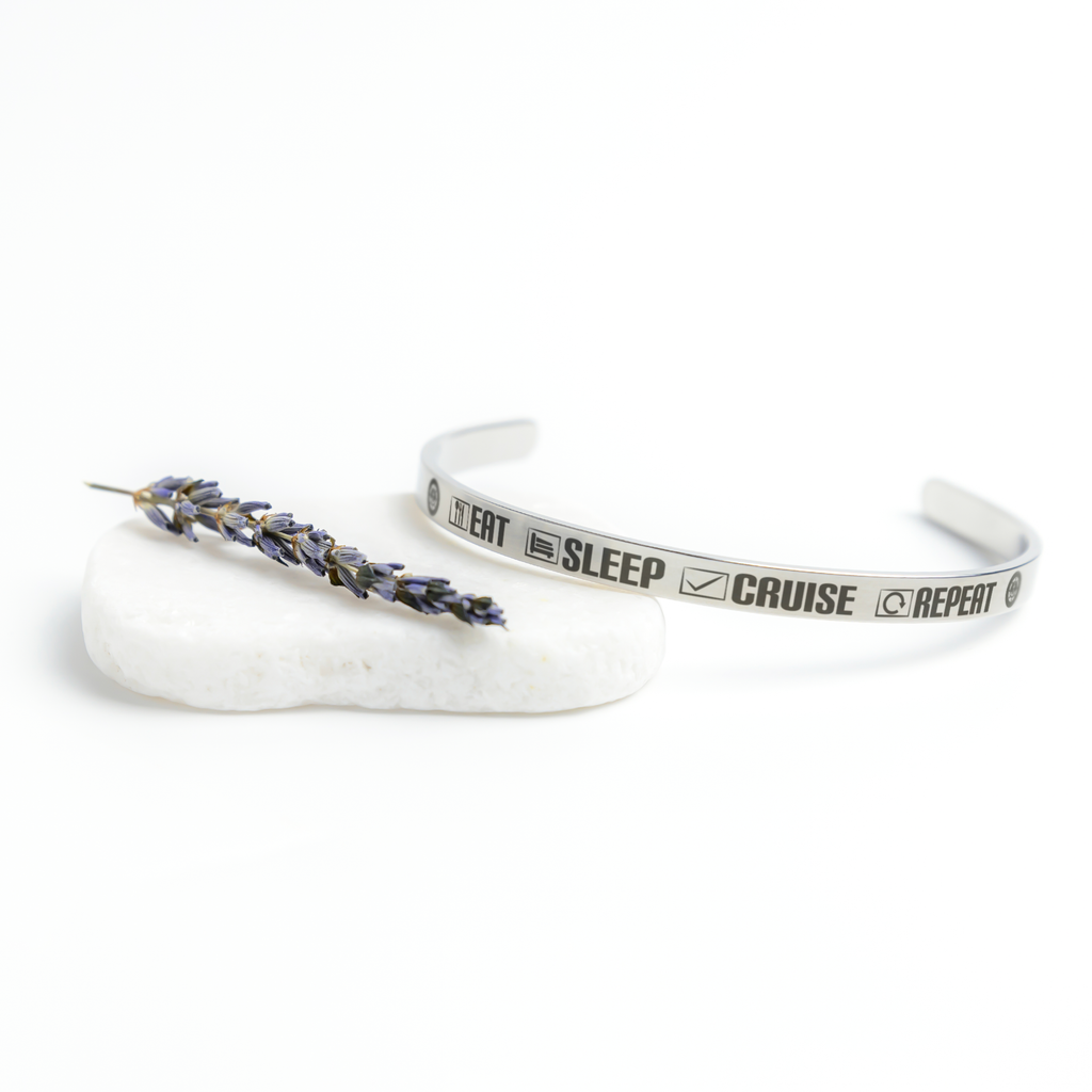 Eat_Sleep_Cruise_Repeat_Cuff_Bracelet_Silver_Lifestyle_03_Mockup.png_15282746